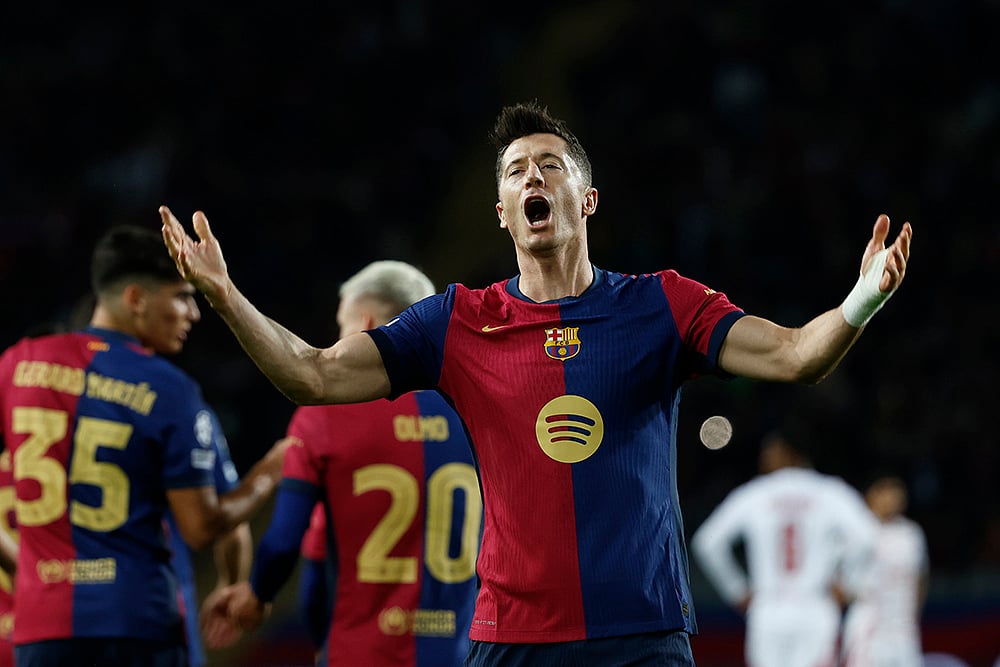 UEFA Champions League soccer Barcelona and Brest football gallery: Robert Lewandowski 