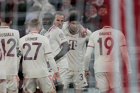 UEFA Champions League: Bayern's Kim Min-jae, second right, celebrates with teammates after scoring the opening goal