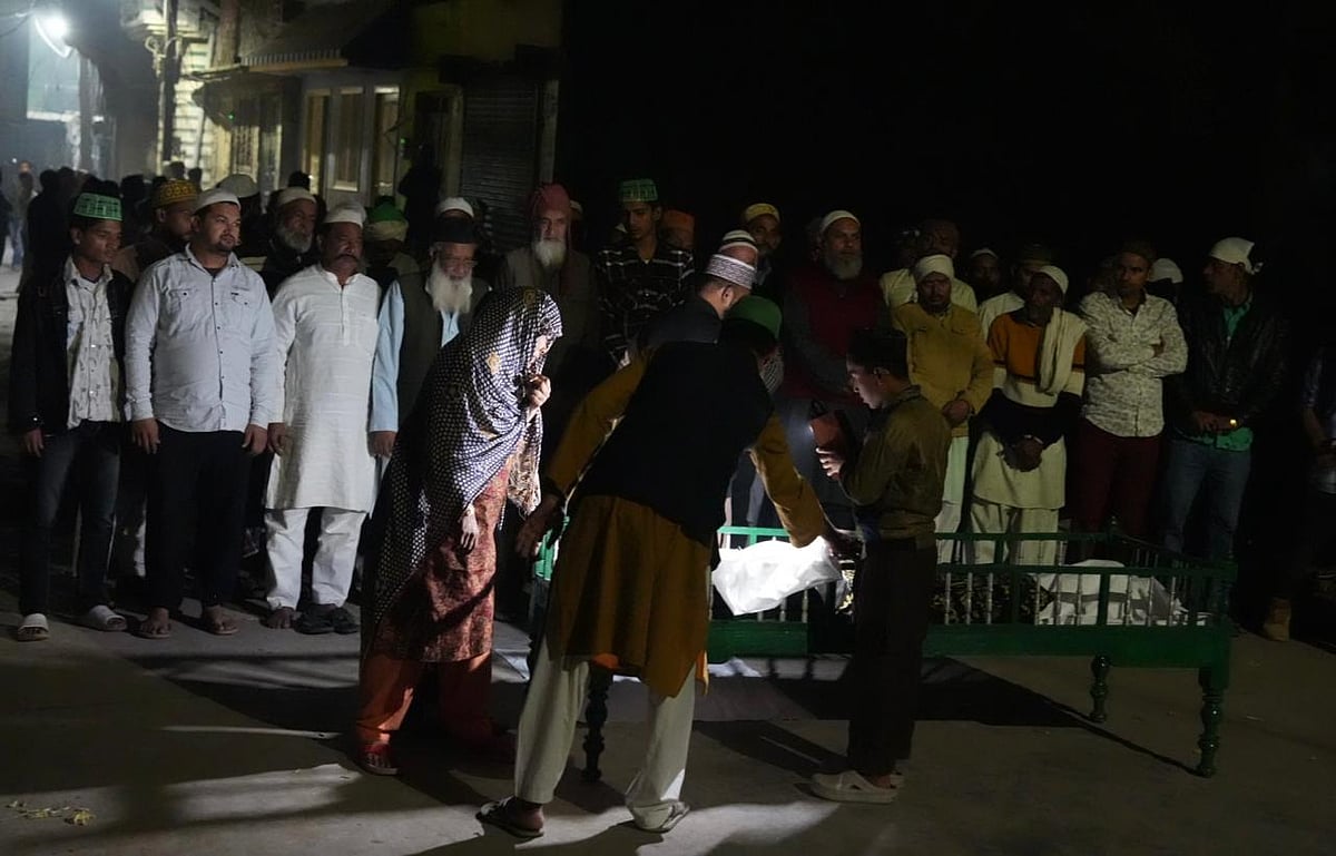 Ayans body being taken for burial