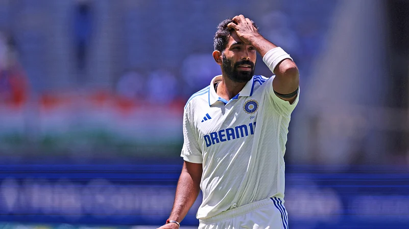 Indias captain Jasprit Bumrah gestures as he prepares to bowl. AP Photo