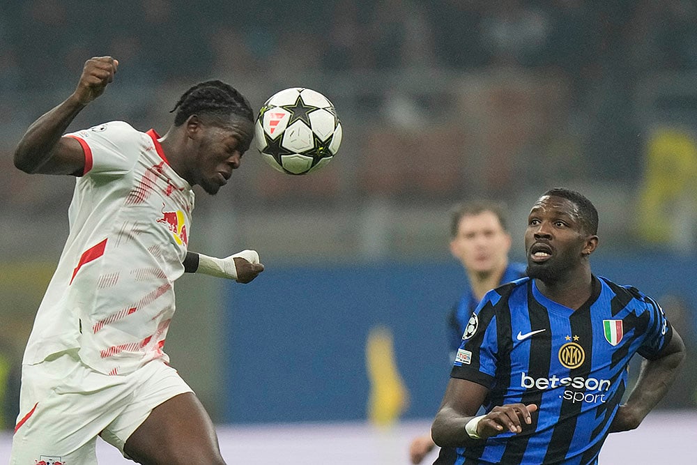 UEFA Champions League soccer Inter Milan vs Leipzig football gallery: Castello Lukeba 