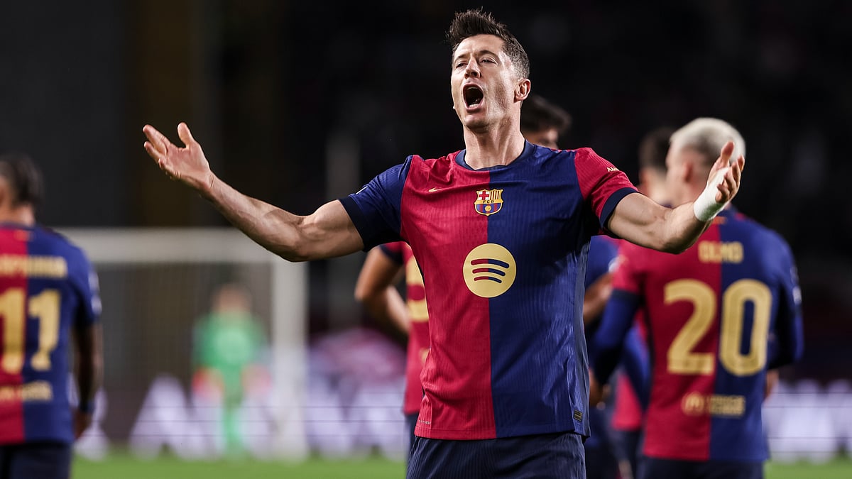Robert Lewandowski celebrates after scoring against Brest