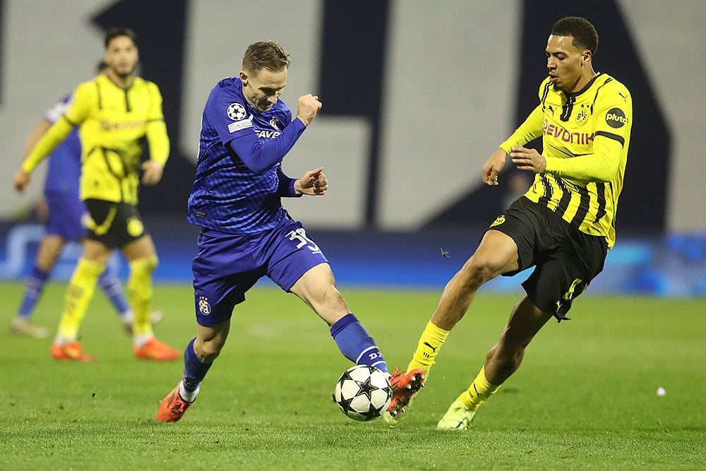 | Photo: AP : Champions League 2024-25: Dinamo's Marko Rog, left, and Dortmund's Felix Nmecha vie for the ball 