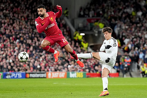 Champions League 2024-25: Liverpool's Mohamed Salah vies for the ball with Real Madrid's Arda Guler