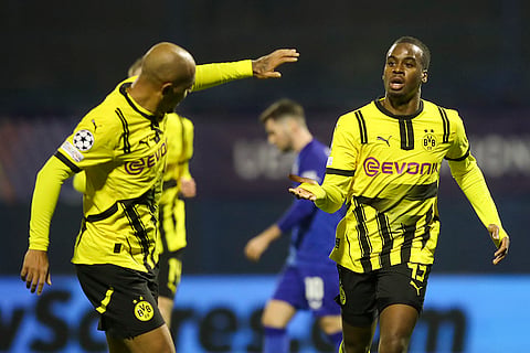 Champions League 2024-25: Dortmund's Jamie Bynoe-Gittens, right, celebrates after scoring his side's opening goal 