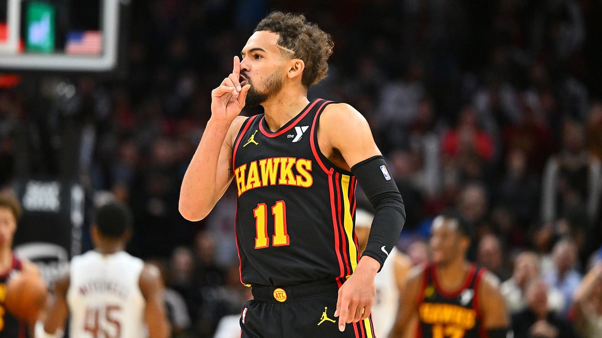 Trae Young #11 of the Atlanta Hawks silences the crowd during the fourth quarter against the Cleveland Cavaliers at Rocket Mortgage Fieldhouse on November 27, 2024 in Cleveland, Ohio. The Hawks defeated the Cavaliers 135-124. - null