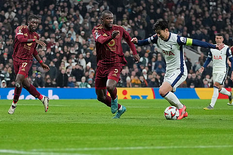 UEFA Europa League: Tottenham's Son Heung-min, right and Roma's Evan Ndicka vie for the ball