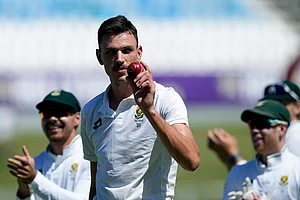 | Photo: AP/Themba Hadebe : RSA Vs SL, 1st Test: South Africa's Marco Jansen leaves the field as he holds the ball after taking seven wickets