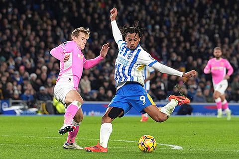 English Premier League: Southampton's Flynn Downes, left, and Brighton's Joao Pedro battle for the ball