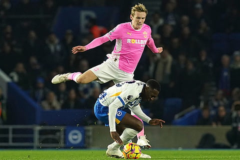 English Premier League: Southampton's Flynn Downes, top, and Brighton's Danny Welbeck battle for the ball