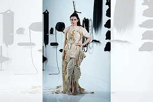 Photo: Vikram Sharma : Standing Tall: Shalini Passi in a Samant Chauhan outfit, inspired by Patna-based artist Rajat Ghosh’s ‘Evolution of Man’ series. She is standing in front of Delhi-based artist Anita Dube’s 1998 artwork ‘The Theatre of Sade’