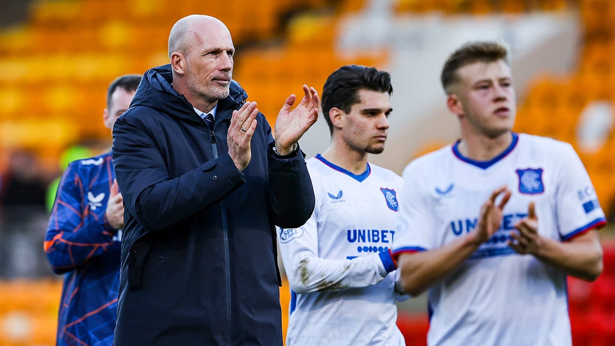 Philippe Clement celebrates with the away supporters after Rangers' win on Sunday