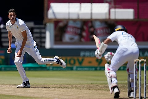 RSA Vs SL, 1st Test Day 4: South Africa's Marco Jansen, left, bowls against Sri Lanka's Dinesh Chandimal 