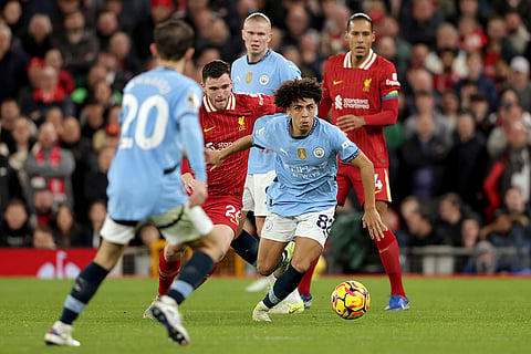 English Premier League 2024-25: Manchester City's Rico Lewis runs with the ball 