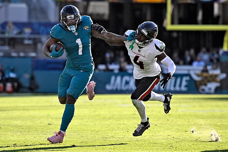 Houston Texans vs Jacksonville Jaguars NFL Football photo gallery: Travis Etienne