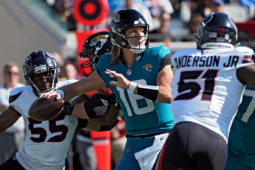 Houston Texans vs Jacksonville Jaguars NFL Football photo gallery: Trevor Lawrence