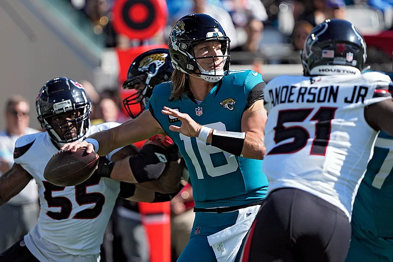 Houston Texans vs Jacksonville Jaguars NFL Football photo gallery: Trevor Lawrence