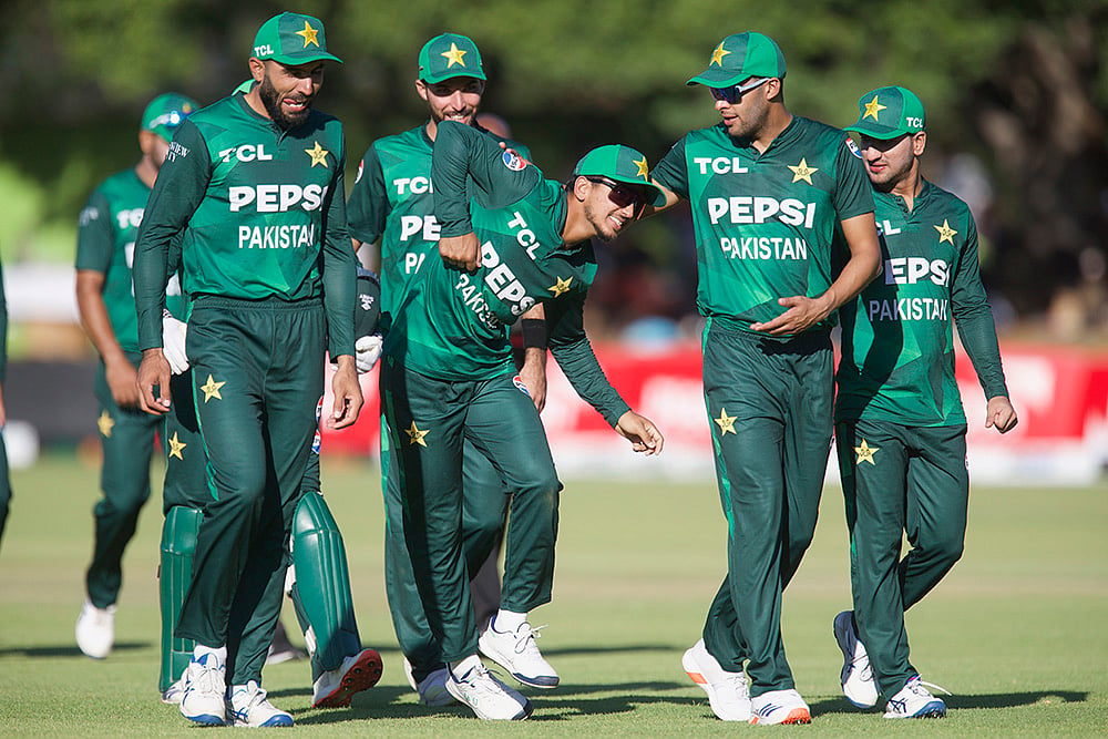 | Photo: AP/Wonder Mashura : ZIM vs PAK 1st T20 Cricket: Pakistan players celebrate a wicket