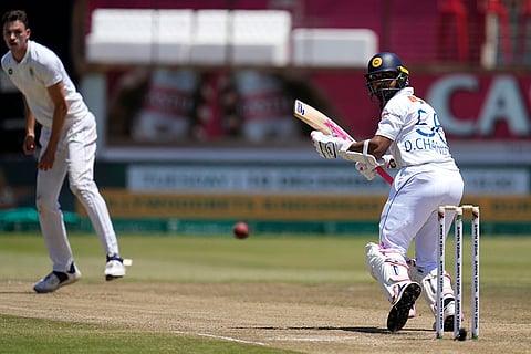 RSA Vs SL, 1st Test Day 4: Sri Lanka's Dinesh Chandimal, right, watches his shot 