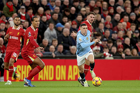 English Premier League 2024-25: Manchester City's Phil Foden runs away with the ball
