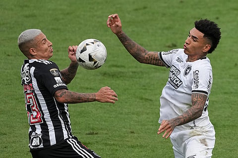 Copa Libertadores Final: Guilherme Arana of Atletico Mineiro, left, and Igor Jesus of Botafogo battle for the ball