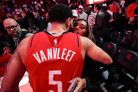 NBA: Rockets guard Fred VanVleet (5) greets his girlfriend, Shontai Neal