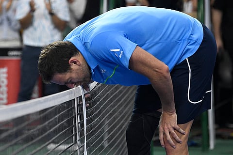 Juan Martin Del Porto Retires: Argentina's Del Potro kisses the net 