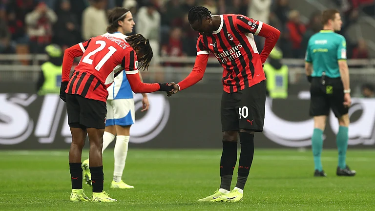 Samuel Chukwueze and Tammy Abraham celebrate at San Siro - null