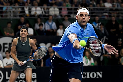 Juan Martin Del Porto Retires: Juan Martin Del Potro returns the ball alongside Gabriela Sabatini 