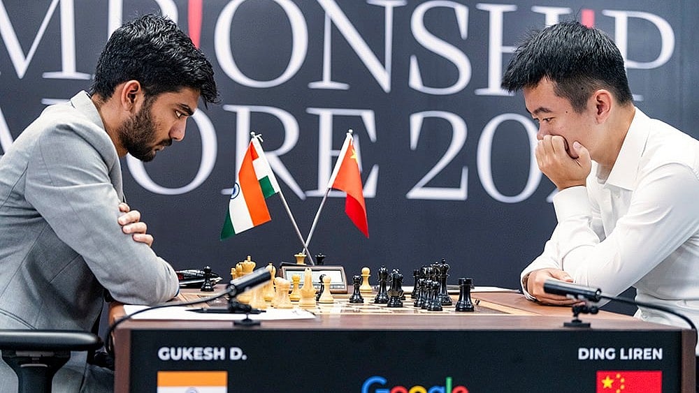 Photo: FIDE/Eng Chin An via PTI : FIDE World Chess Championship: D Gukesh and Ding Liren during the fifth game.