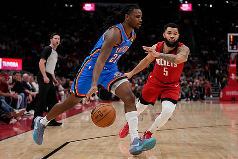 NBA: Rockets guard Fred VanVleet (5) defends against Thunder guard Cason Wallace
