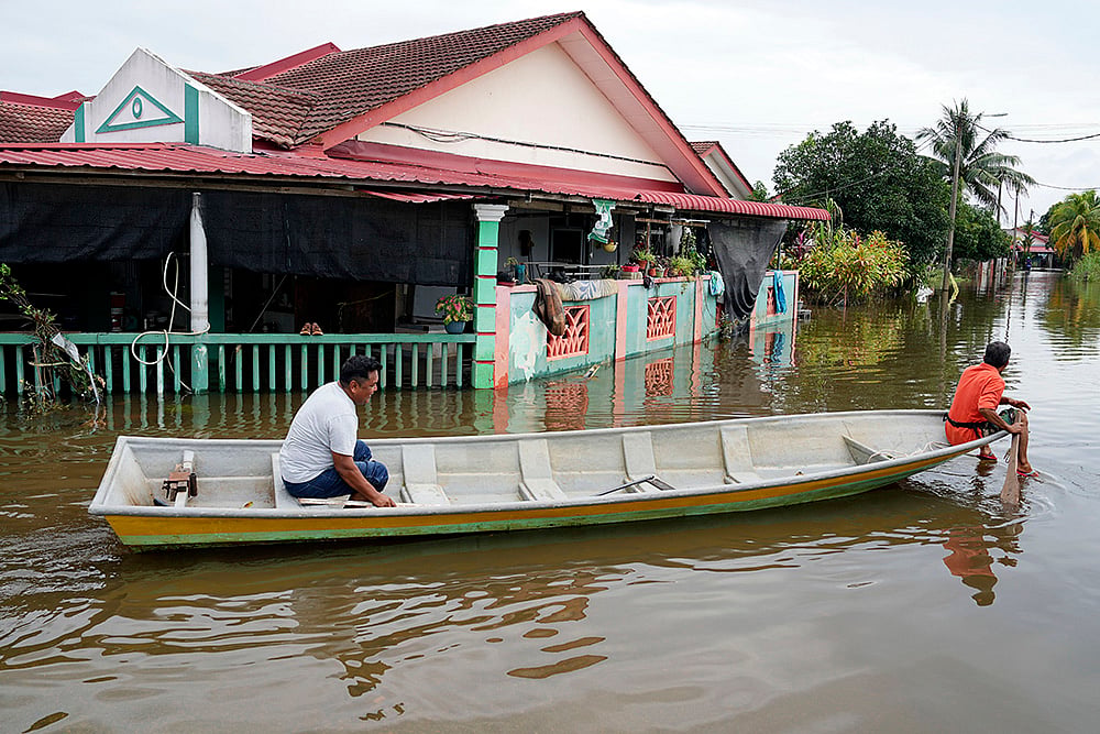 Floods wreak havoc in Malaysia photos: 5