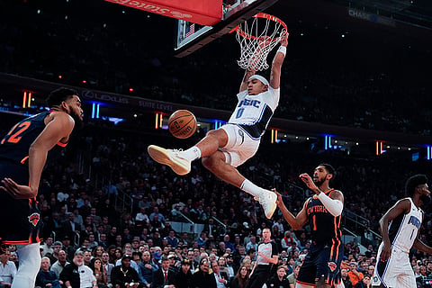 NBA Cup 2024: Magic guard Anthony Black (0) dunks