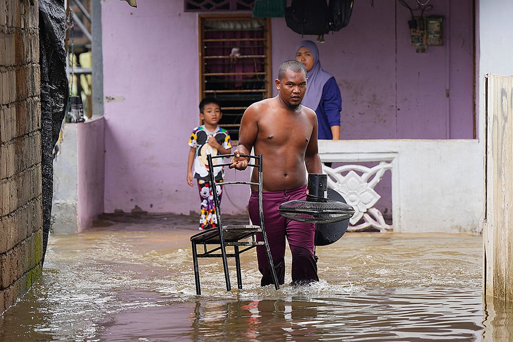 Floods wreak havoc in Malaysia photos: 3