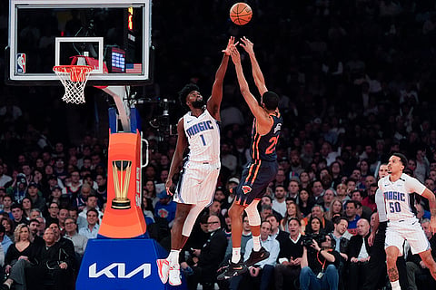 NBA Cup 2024: Knicks forward Mikal Bridges (25) shoots past Magic forward Jonathan Isaac