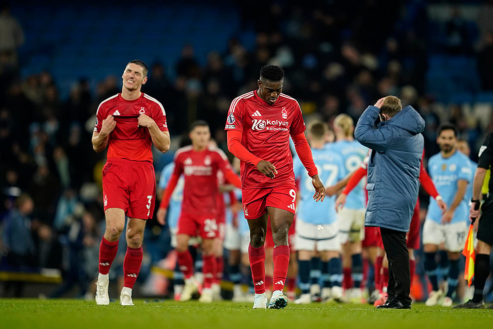 | Photo: AP/Dave Thompson : EPL 2024-25: Nottingham Forest's Taiwo Awoniyi, centre, reacts after the match