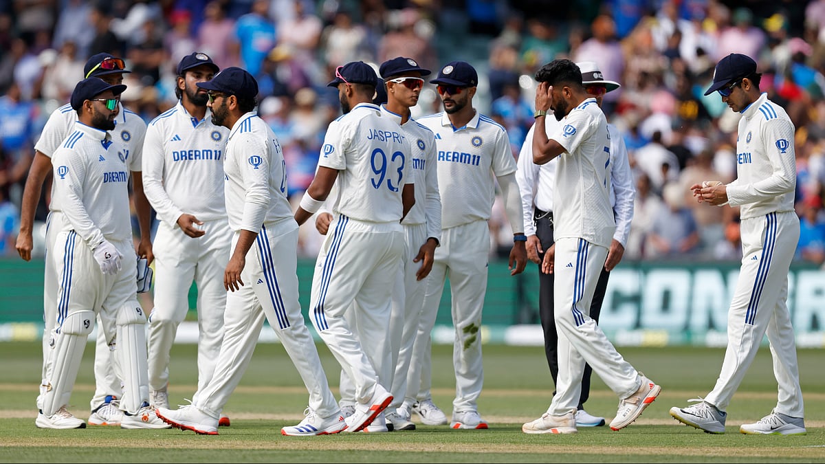 Indian players leave the field after their loss in the second Test. AP Photo