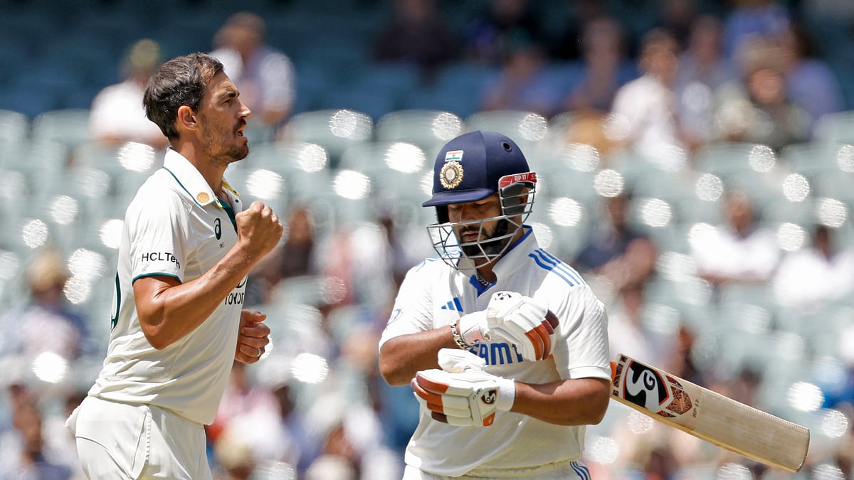 Australias Mitchell Starc celebrates the dismissal of Indias Rishabh Pant. AP Photo
