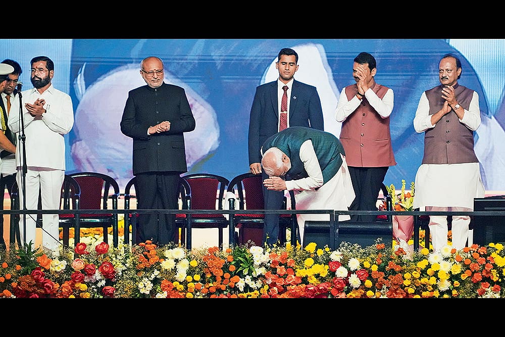 | Photo: PTI : Sweeping Victory: Prime Minister Narendra Modi with Maharashtra Chief Minister Devendra Fadnavis and Deputy Chief Ministers Eknath Shinde and Ajit Pawar during the swearing-in ceremony in Mumbai on December 5, 2024