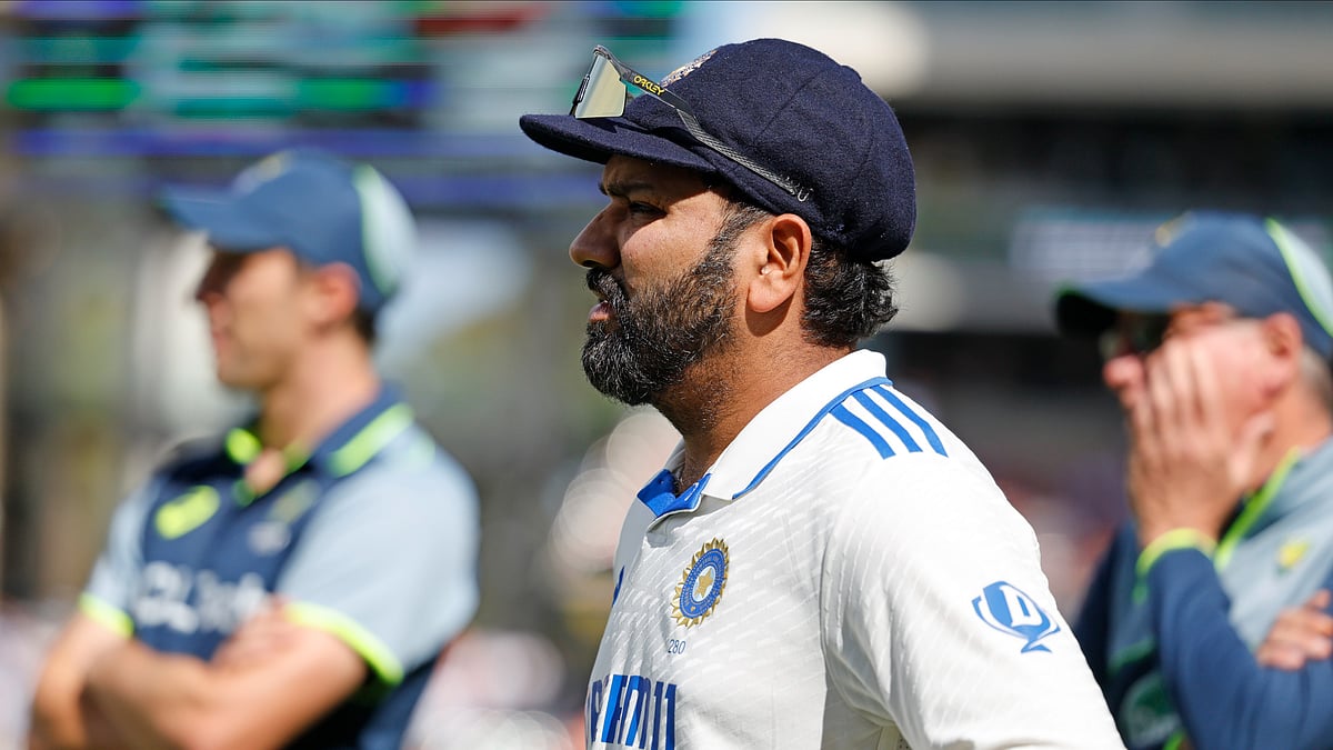 Indias captain Rohit Sharma reacts during the presentation ceremony. AP Photo