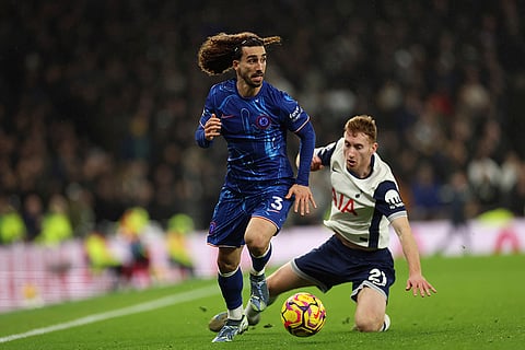 EPL 2024-25, TOT vs CHE: Chelsea's Marc Cucurella challenges for the ball with Tottenham's Dejan Kulusevski 