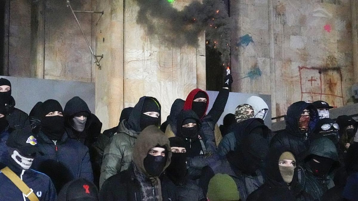 | Photo- AP : Journalists In Georgia Brutally Beaten As Protests Intensify Over EU Talks Freeze