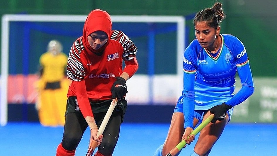 X/Hockey India : Action from the India vs Malaysia, Pool A match in Women's Junior Asia Cup.