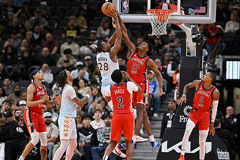 NBA Pelicans vs Spurs Basketball: Spurs' Charles Bassey (28) attempts to shoot against Pelicans' Yves Missi (21) 