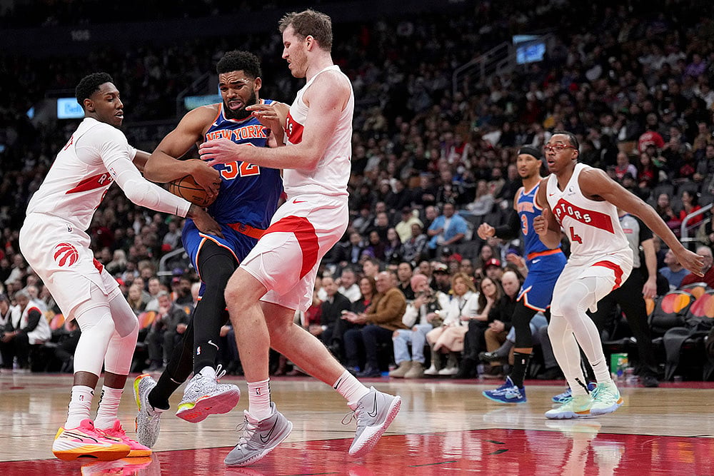NBA New York Knicks vs Toronto Raptors basketball game photos: Karl-Anthony Towns