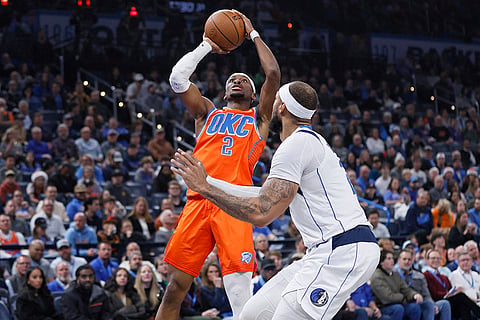 NBA Cup quarterfinals: Thunder guard Shai Gilgeous-Alexander (2) shoots against Mavericks center Daniel Gafford