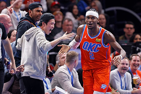 NBA Cup quarterfinals: Thunder guard Shai Gilgeous-Alexander (2) celebrates with fans 