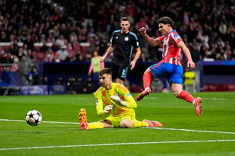 UEFA Champions League: Atletico Madrid's Julian Alvarez, right, makes an attempt to score 