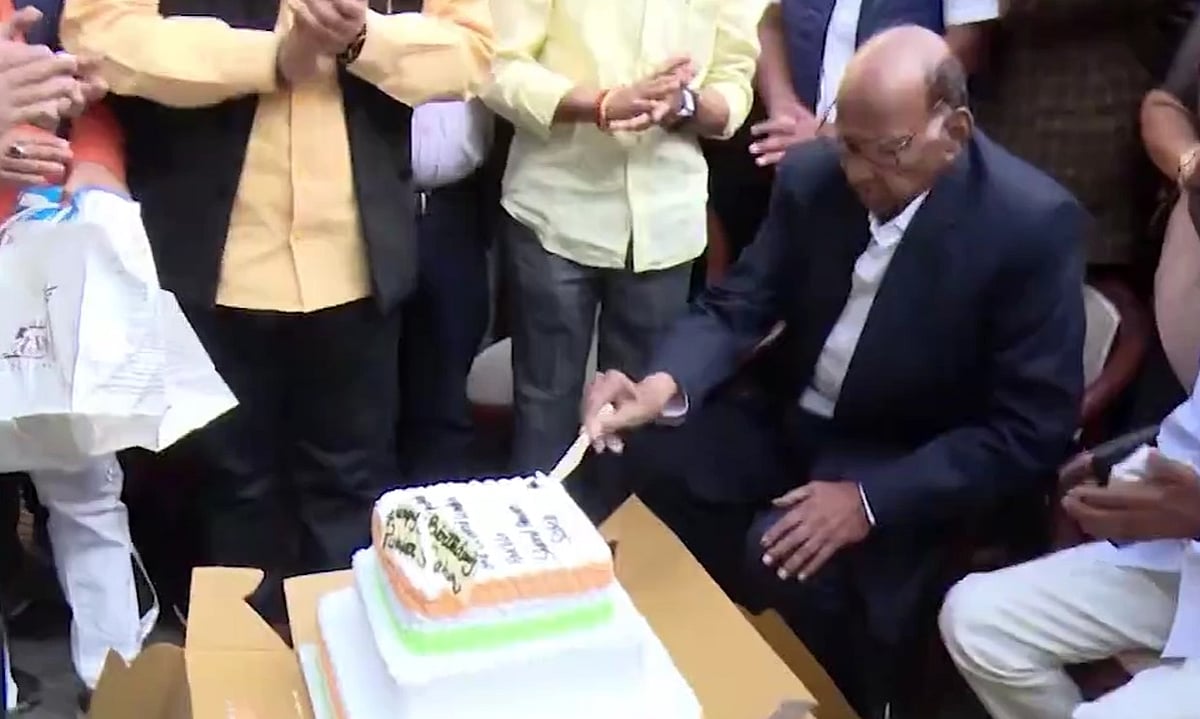 Sharad Pawar cuts cake on his 84th birthday - PTI