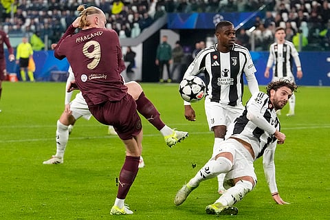 UEFA Champions League: Manchester City's Erling Haaland, left, makes an attempt to score